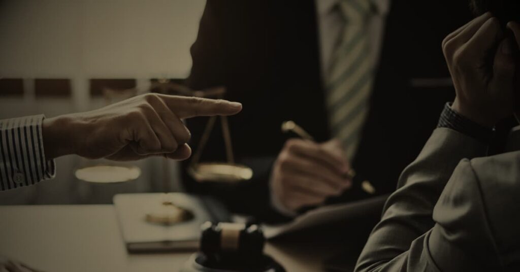 Condominium dispute attorneys discussing legal case with gavel and scales of justice