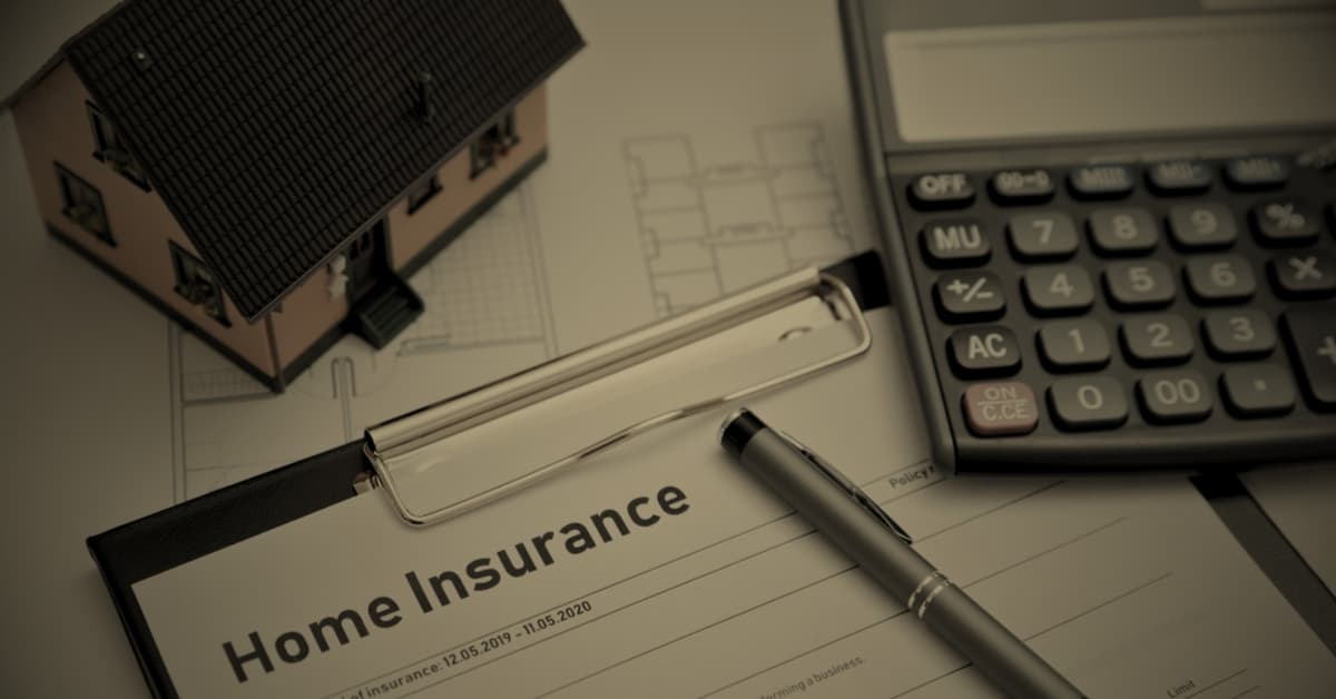 Homeowners insurance claim denied Florida — home insurance documents with house model and calculator